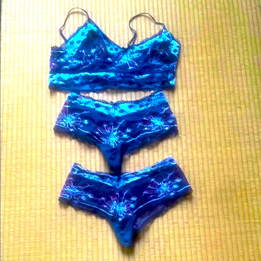 Matching bralette and two cheeky underwear bottoms.